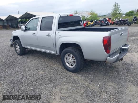 2010 Chevrolet Colorado 1LT z VIN 1GCJTCDEXA8114061, wystawiony jako IAAI lot #42235820 z przebiegiem 218 972 mil mil oraz . Historia ofert i sprzedaży dostępna na DreamBid. Obrazek 3.