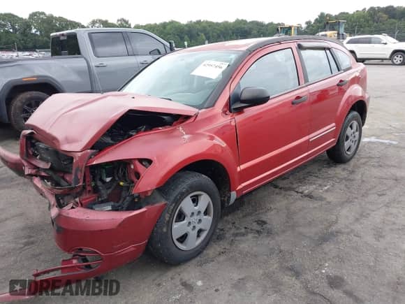 2008 Dodge Caliber SE with VIN 1B3HB28B18D561909, listed as a IAAI auction lot 42957456 with 167,709 mi miles and . Bid and sale history available at DreamBid. Image 2.