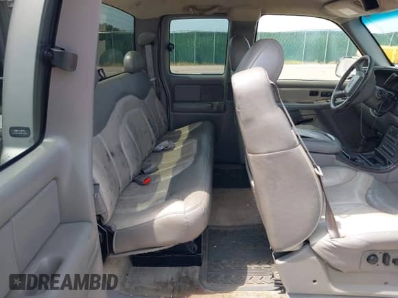 2002 GMC Sierra 1500 Denali z VIN 2GTFK69U621313333, wystawiony jako IAAI lot #42865188 z przebiegiem 200 820 mil mil oraz . Historia ofert i sprzedaży dostępna na DreamBid. Obrazek 8.