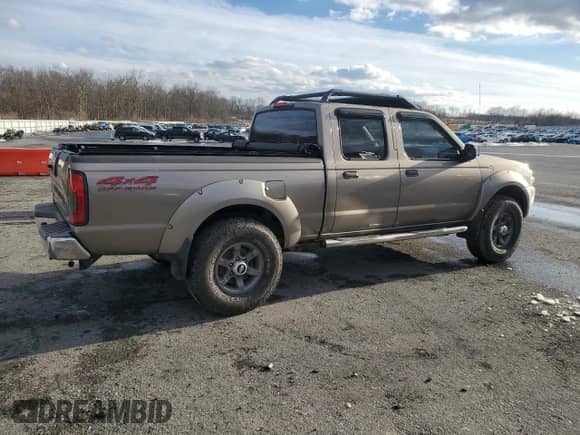 2004 Nissan Frontier XE with VIN 1N6ED29Y64C438425, listed as a Copart auction lot 44464555 with 175,749 mi miles and Clean title. Bid and sale history available at DreamBid. Image 3.