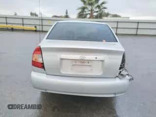 2002 Hyundai Accent GL с VIN KMHCG45C02U301443, выставлен на аукционе Copart как лот 80670164 с пробегом 124 163 миль миль и Списание • Salvage title. История ставок и продаж доступна на DreamBid. Изображение 6.