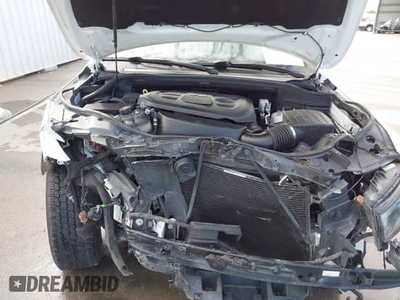 2018 Jeep Grand Cherokee Laredo E with VIN 1C4RJFAG1JC370361, listed as a IAAI auction lot 43284928 with 75,952 mi miles and . Bid and sale history available at DreamBid. Image 9.