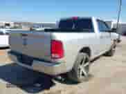 2018 Ram 1500 SLT with VIN 1C6RR6GG7JS303857, listed as a IAAI auction lot 41779748 with 153,289 mi miles and . Bid and sale history available at DreamBid. Image 4.