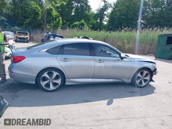 2019 Honda Accord Touring with VIN 1HGCV2F96KA018937, listed as a IAAI auction lot 42462118 with 82,260 mi miles and . Bid and sale history available at DreamBid. Image 14.