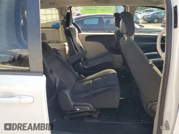 2016 Dodge Grand Caravan SE с VIN 2C4RDGBG7GR370375, выставлен на аукционе Copart как лот 80007635 с пробегом 105 908 миль миль и Списание • Salvage title. История ставок и продаж доступна на DreamBid. Изображение 11.