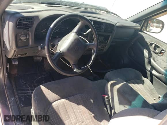 2002 Chevrolet S-10 LS with VIN 1GCCS145X28102414, listed as a Copart auction lot 76543574 with 185,819 mi miles and Salvage title. Bid and sale history available at DreamBid. Image 8.