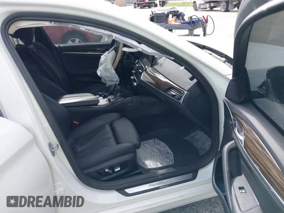 2018 BMW 5 Series 530i xDrive with VIN WBAJA7C52JG909607, listed as a IAAI auction lot 38487020 with Not provided miles and . Bid and sale history available at DreamBid. Image 5.