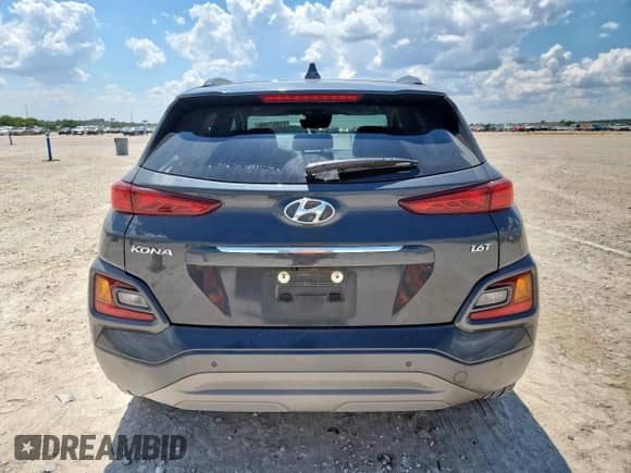 2020 Hyundai Kona Ultimate с VIN KM8K53A5XLU421139, выставлен на аукционе Copart как лот 71557165 с пробегом 128 218 миль миль и Списание • Salvage title. История ставок и продаж доступна на DreamBid. Изображение 6.