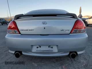 2005 Hyundai Tiburon GT с VIN KMHHN65F05U171038, выставлен на аукционе Copart как лот 87765735 с пробегом 113 129 миль миль и Списание • Salvage title. История ставок и продаж доступна на DreamBid. Изображение 6.