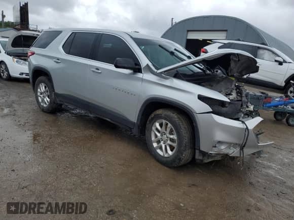 2018 Chevrolet Traverse LS with VIN 1GNEVLKW9JJ236336, listed as a Copart auction lot 56038595 with 104,174 mi miles and Salvage title. Bid and sale history available at DreamBid. Image 4.