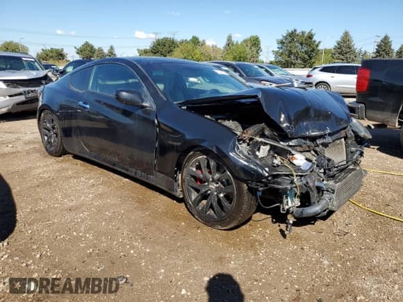 2014 Hyundai Genesis Coupe 2.0T z VIN KMHHT6KD5EU121471, wystawiony jako Copart lot #72702234 z przebiegiem 109 964 mil mil oraz Szkoda całkowita • Salvage title. Historia ofert i sprzedaży dostępna na DreamBid. Obrazek 4.