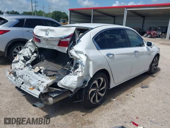 2017 Honda Accord EX-L with VIN 1HGCR2F94HA006962, listed as a IAAI auction lot 42539217 with 125,163 mi miles and . Bid and sale history available at DreamBid. Image 4.