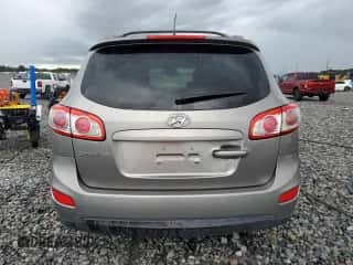 2012 Hyundai Santa Fe SE z VIN 5XYZH4AG2CG144263, wystawiony jako Copart lot #81185525 z przebiegiem 134 304 mil mil oraz Szkoda całkowita • Salvage title. Historia ofert i sprzedaży dostępna na DreamBid. Obrazek 6.