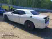 2016 Dodge Challenger SRT Hellcat with VIN 2C3CDZC99GH239296, listed as a IAAI auction lot 42057592 with 63,826 mi miles and . Bid and sale history available at DreamBid. Image 3.