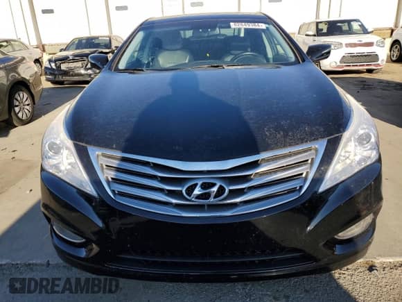 2013 Hyundai Azera с VIN KMHFH4JG2DA204770, выставлен на аукционе Copart как лот 82849384 с пробегом 88 246 миль миль и Списание • Salvage title. История ставок и продаж доступна на DreamBid. Изображение 5.