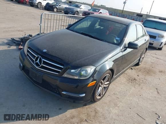 2014 Mercedes-Benz C 250 Sport with VIN WDDGF4HB0EA960873, listed as a IAAI auction lot 43525113 with 93,094 mi miles and . Bid and sale history available at DreamBid. Image 2.
