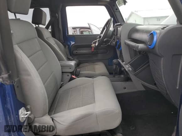 2009 Jeep Wrangler Sahara с VIN 1J4FA54199L773157, выставлен на аукционе Copart как лот 46071945 с пробегом 136 799 миль миль и Списание • Salvage title. История ставок и продаж доступна на DreamBid. Изображение 7.