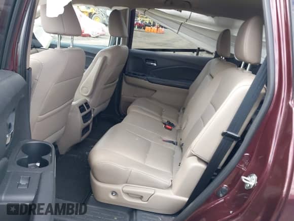 2017 Honda Pilot EX-L with VIN 5FNYF6H74HB040889, listed as a IAAI auction lot 42040094 with 84,001 mi miles and . Bid and sale history available at DreamBid. Image 8.