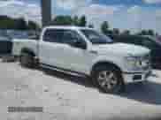 2018 Ford F-150 XL with VIN 1FTFW1E56JFB06213, listed as a Copart auction lot 70338995 with 182,418 mi miles and Clean title. Bid and sale history available at DreamBid. Image 4.