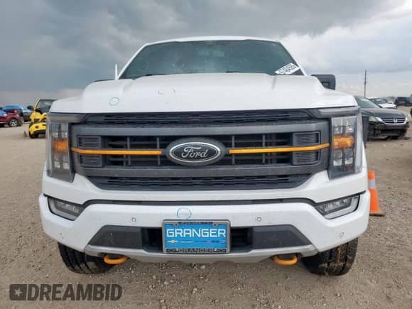 2023 Ford F-150 XL with VIN 1FTEW1E83PFB44870, listed as a Copart auction lot 67404595 with 69,006 mi miles and Salvage title. Bid and sale history available at DreamBid. Image 5.