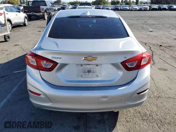 2017 Chevrolet Cruze LT с VIN 1G1BE5SM3H7212104, выставлен на аукционе Copart как лот 80961725 с пробегом 128 823 миль миль и Списание • Salvage title. История ставок и продаж доступна на DreamBid. Изображение 6.