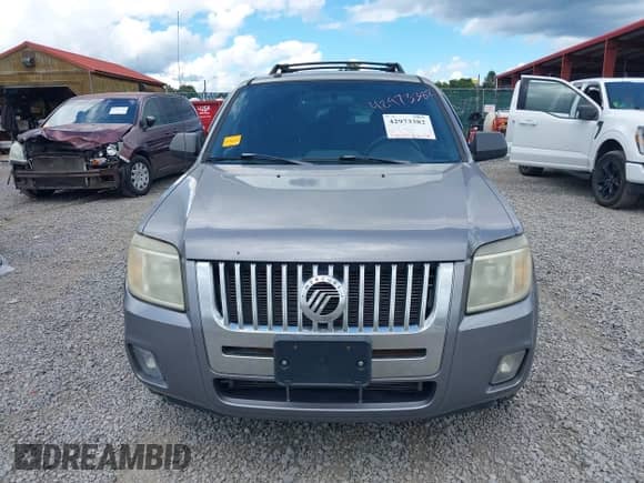 2008 Mercury Mariner with VIN 4M2CU91178KJ14388, listed as a IAAI auction lot 42973382 with 219,954 mi miles and . Bid and sale history available at DreamBid. Image 12.