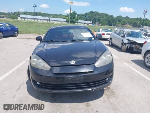 2007 Hyundai Tiburon GT с VIN KMHHN66F17U261929, выставлен на аукционе IAAI как лот 42679006 с пробегом 100 213 миль миль и . История ставок и продаж доступна на DreamBid. Изображение 12.