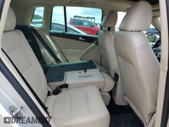 2013 Volkswagen Tiguan SE with VIN WVGAV7AX0DW556558, listed as a Copart auction lot 55574395 with 94,882 mi miles and Salvage title. Bid and sale history available at DreamBid. Image 11.