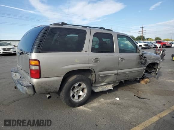 2001 Chevrolet Tahoe LT with VIN 1GNEK13T11J222092, listed as a Copart auction lot 70934935 with Not provided miles and Salvage title. Bid and sale history available at DreamBid. Image 3.