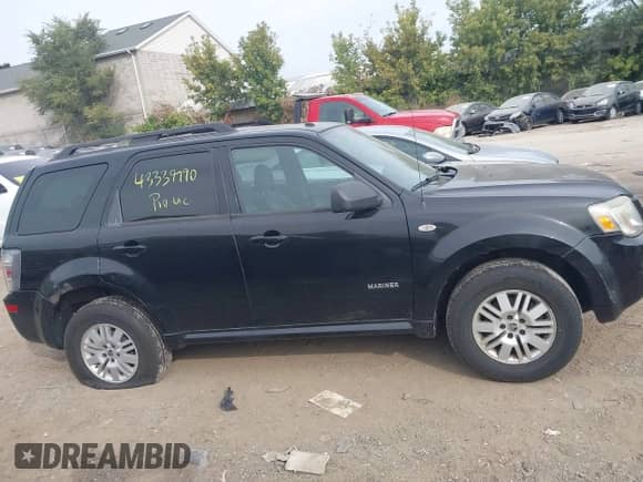 2008 Mercury Mariner with VIN 4M2CU91108KJ51427, listed as a IAAI auction lot 43339990 with 227,044 mi miles and . Bid and sale history available at DreamBid. Image 13.