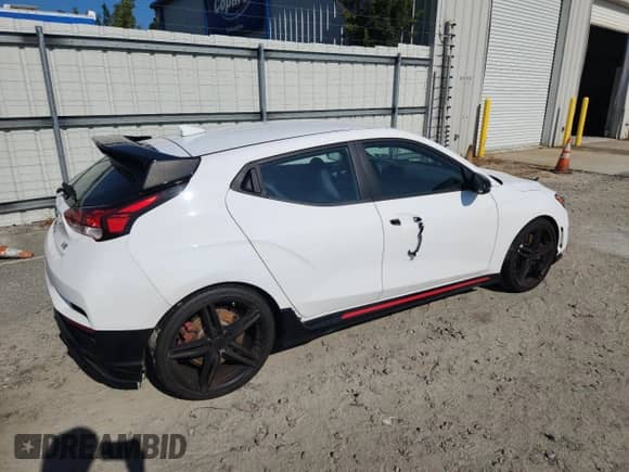 2022 Hyundai Veloster z VIN KMHT36AH0NU013791, wystawiony jako Copart lot #63401035 z przebiegiem 78 597 mil mil oraz Szkoda całkowita • Salvage title. Historia ofert i sprzedaży dostępna na DreamBid. Obrazek 3.