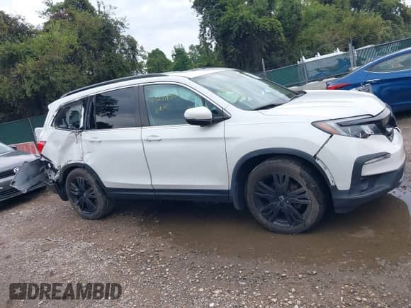 2021 Honda Pilot Special Edition with VIN 5FNYF6H22MB034734, listed as a IAAI auction lot 43291080 with 162,677 mi miles and . Bid and sale history available at DreamBid. Image 13.