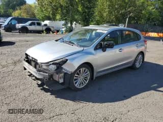 2012 Subaru Impreza Premium with VIN JF1GPAD67CH217118, listed as a Copart auction lot 81079945 with 68,452 mi miles and Salvage title. Bid and sale history available at DreamBid. Image 1.