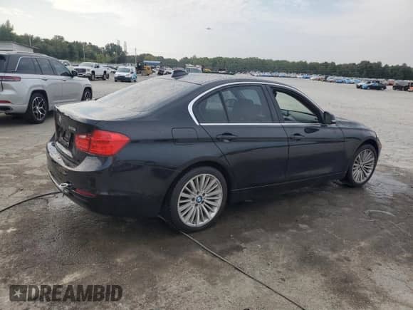 2015 BMW 3 Series 328i with VIN WBA3A5C56FF609918, listed as a Copart auction lot 81403405 with 154,602 mi miles and Salvage title. Bid and sale history available at DreamBid. Image 3.