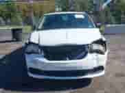 2014 Dodge Grand Caravan SE with VIN 2C4RDGBG0ER379853, listed as a IAAI auction lot 43251278 with 149,299 mi miles and . Bid and sale history available at DreamBid. Image 6.