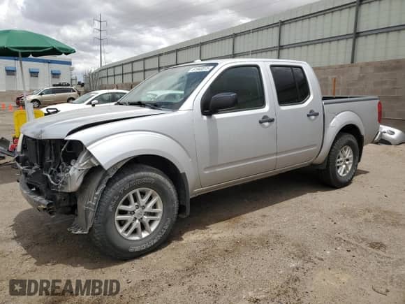 2014 Nissan Frontier S with VIN 1N6AD0EV7EN742755, listed as a Copart auction lot 61940075 with 137,252 mi miles and Salvage title. Bid and sale history available at DreamBid. Image 1.