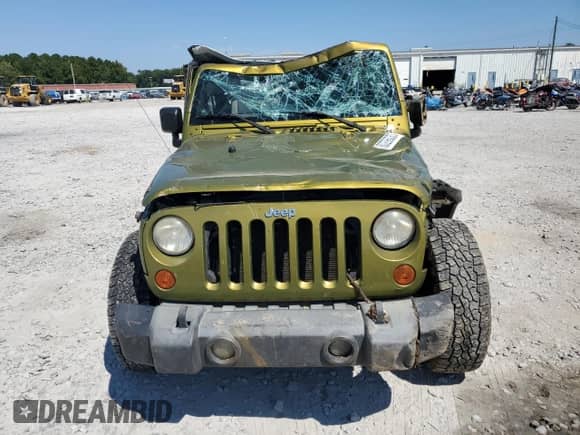 2007 Jeep Wrangler Unlimited X с VIN 1J4GB39107L118865, выставлен на аукционе Copart как лот 80206035 с пробегом 248 505 миль миль и Списание • Salvage title. История ставок и продаж доступна на DreamBid. Изображение 5.