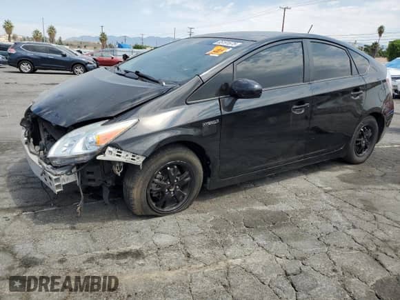 2015 Toyota Prius Four z VIN JTDKN3DU1F1996758, wystawiony jako Copart lot #65191675 z przebiegiem 110 277 mil mil oraz Szkoda całkowita • Salvage title. Historia ofert i sprzedaży dostępna na DreamBid. Obrazek 1.