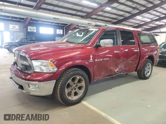 2011 Ram 1500 SLT with VIN 1D7RV1CT0BS625905, listed as a Copart auction lot 57615165 with 149,510 mi miles and Salvage title. Bid and sale history available at DreamBid. Image 1.