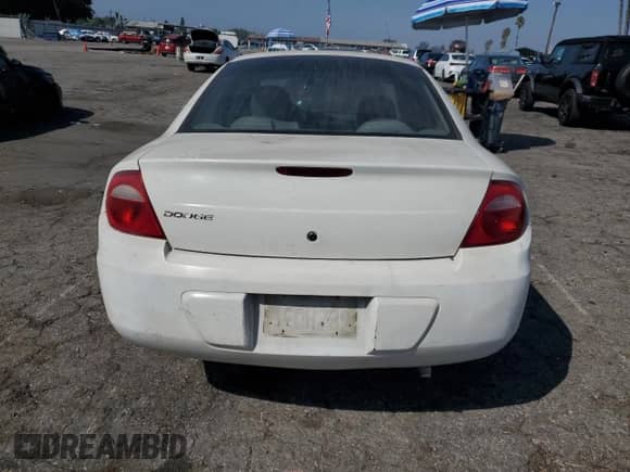 2004 Dodge Neon SE with VIN 1B3ES26C84D557834, listed as a Copart auction lot 72756434 with 235,046 mi miles and Salvage title. Bid and sale history available at DreamBid. Image 6.