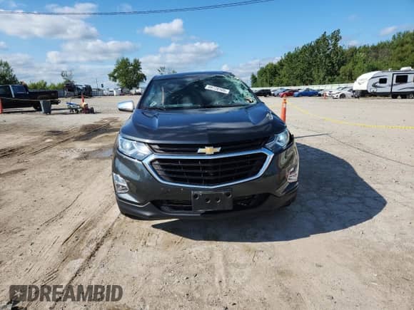 2018 Chevrolet Equinox LT с VIN 2GNAXKEX9J6229911, выставлен на аукционе Copart как лот 69728105 с пробегом 84 149 миль миль и Списание • Salvage title. История ставок и продаж доступна на DreamBid. Изображение 5.