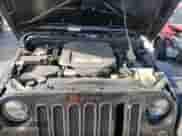 2015 Jeep Wrangler Willys Wheeler with VIN 1C4AJWAG6FL543974, listed as a Copart auction lot 70053794 with 85,011 mi miles and Salvage title. Bid and sale history available at DreamBid. Image 13.