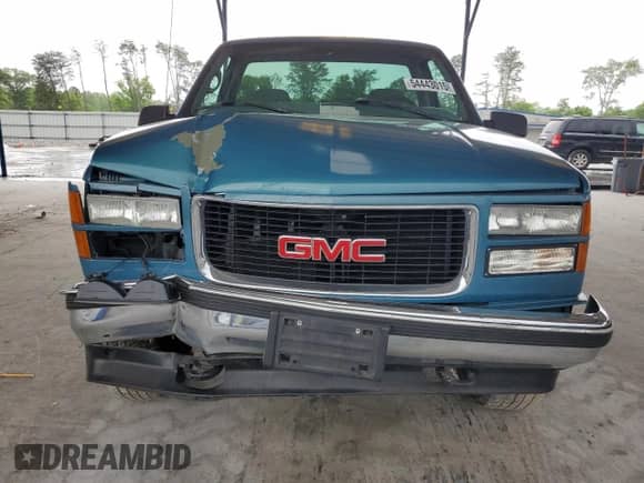 1997 GMC Sierra 1500 с VIN 1GTEK14R2VZ514577, выставлен на аукционе Copart как лот 54443015 с пробегом 214 823 миль миль и Списание • Salvage title. История ставок и продаж доступна на DreamBid. Изображение 5.