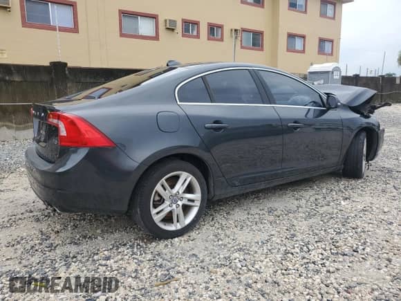 2015 Volvo S60 T5 Drive-E Premier with VIN YV140MFK4F1348785, listed as a Copart auction lot 80026105 with 74,217 mi miles and Salvage title. Bid and sale history available at DreamBid. Image 3.