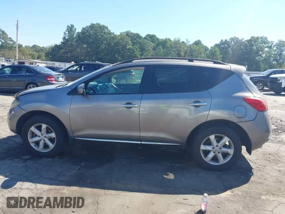 2009 Nissan Murano LE with VIN JN8AZ18WX9W153170, listed as a IAAI auction lot 43192895 with 137,071 mi miles and . Bid and sale history available at DreamBid. Image 14.