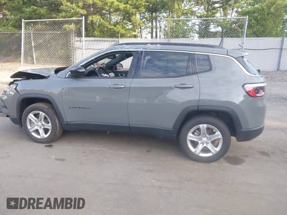 2023 Jeep Compass Latitude z VIN 3C4NJDBN9PT546487, wystawiony jako IAAI lot #43053671 z przebiegiem 16 170 mil mil oraz . Historia ofert i sprzedaży dostępna na DreamBid. Obrazek 14.