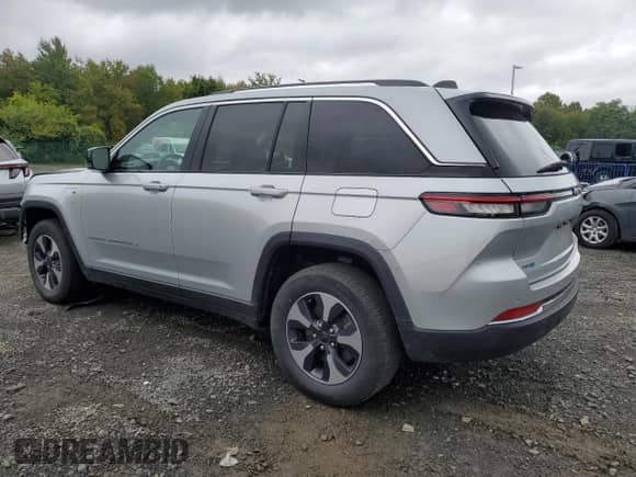 2023 Jeep Grand Cherokee with VIN 1C4RJYB64PC649720, listed as a Copart auction lot 84032325 with 59,572 mi miles and Clean title. Bid and sale history available at DreamBid. Image 2.