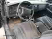 2002 Dodge Dakota Sport с VIN 1B7GG32N02S564002, выставлен на аукционе Copart как лот 81347474 с пробегом Не указан миль и Списание • Salvage title. История ставок и продаж доступна на DreamBid. Изображение 8.