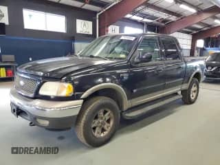 2002 Ford F-150 XLT with VIN 1FTRW08L02KD45511, listed as a Copart auction lot 71658065 with 211,965 mi miles and Clean title. Bid and sale history available at DreamBid. Image 1.