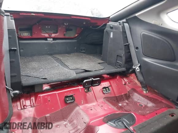 2005 Hyundai Tiburon GS z VIN KMHHM65D35U168510, wystawiony jako IAAI lot #42691110 z przebiegiem 128 386 mil mil oraz . Historia ofert i sprzedaży dostępna na DreamBid. Obrazek 8.